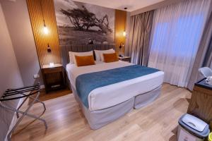 Cama ou camas em um quarto em Alto Andino Hotel