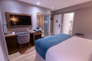 Cama ou camas em um quarto em Alto Andino Hotel