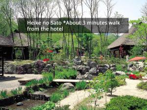 Puutarhaa majoituspaikan KAMENOI HOTEL Nikko Yunishigawa All-Inclusive Resort ulkopuolella
