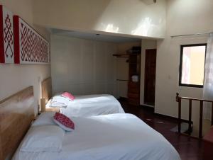 Letto o letti in una camera di J&K Suite