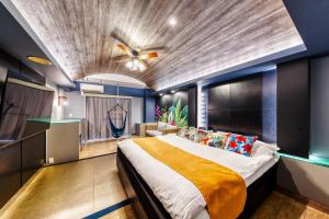 Voodi või voodid majutusasutuse HOTEL ATLANTIS NUMAZU -Adult Only toas