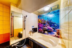 Vannituba majutusasutuses HOTEL ATLANTIS NUMAZU -Adult Only