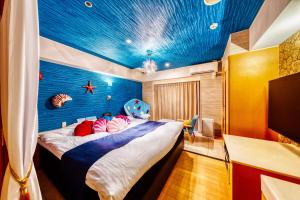 Voodi või voodid majutusasutuse HOTEL ATLANTIS NUMAZU -Adult Only toas