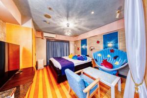 Voodi või voodid majutusasutuse HOTEL ATLANTIS NUMAZU -Adult Only toas