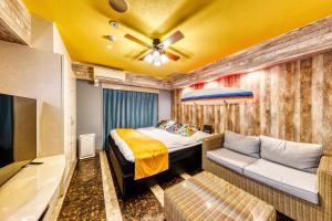 Voodi või voodid majutusasutuse HOTEL ATLANTIS NUMAZU -Adult Only toas