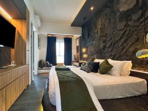 Postel nebo postele na pokoji v ubytování Landmark Villas + 37 fotografií