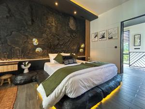 Postel nebo postele na pokoji v ubytování Landmark Villas