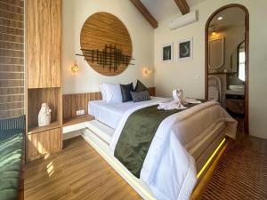 Postel nebo postele na pokoji v ubytování Landmark Villas