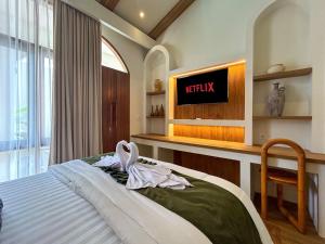 Postel nebo postele na pokoji v ubytování Landmark Villas