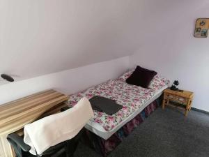 Postel nebo postele na pokoji v ubytování Chalupa U Staňků