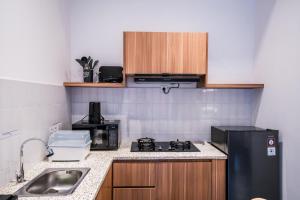 Køkken eller tekøkken på Kumiko Apartment