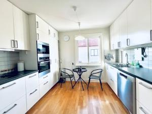 Kuchyň nebo kuchyňský kout v ubytování CozyHouse + 5 fotografií