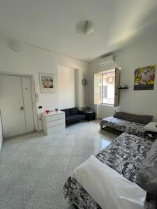 Postel nebo postele na pokoji v ubytování Ziettas Pop House