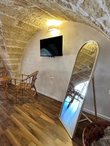 TV a/nebo společenská místnost v ubytování Midi Pool Villa & SPA