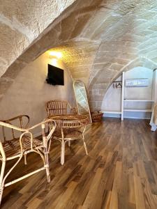 TV a/nebo společenská místnost v ubytování Midi Pool Villa & SPA