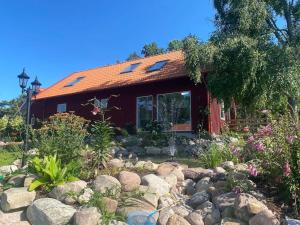 Κήπος έξω από το The Red House in Boda, Revsudden