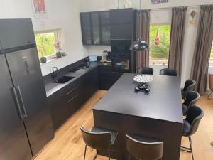 Η κουζίνα ή μικρή κουζίνα στο The Red House in Boda, Revsudden