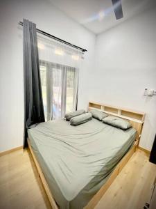 Fotografie z fotogalerie ubytování Modern House with 2 Bedrooms v destinaci Kampungdurian