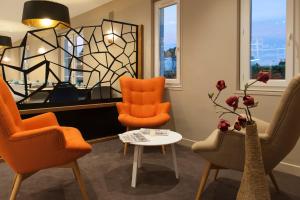 Area soggiorno di Brit Hotel Avignon Sud Le Calendal