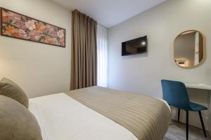 Μια τηλεόραση ή/και κέντρο ψυχαγωγίας στο Hostal Sun Gate
