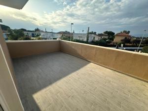 a balcony with a view of a city at Residenza Rizzo Paestum in Paestum +15 photos