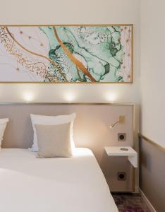 Postel nebo postele na pokoji v ubytování Brit Hotel Orléans St Jean de Braye - L'Antarès