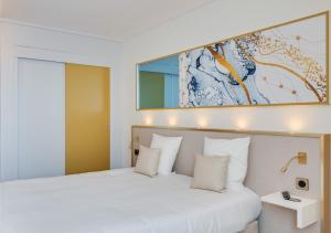 Postel nebo postele na pokoji v ubytování Brit Hotel Orléans St Jean de Braye - L'Antarès