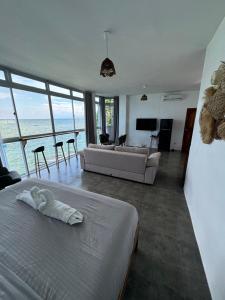 Postel nebo postele na pokoji v ubytování CocoRico Siquijor