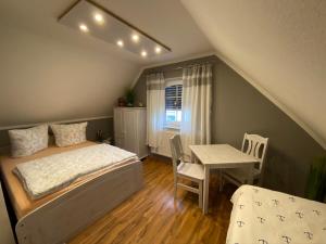 Postel nebo postele na pokoji v ubytování Ferienhaus -Möwennest-