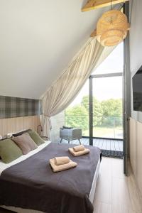 Posteľ alebo postele v izbe v ubytovaní Campo Resort
