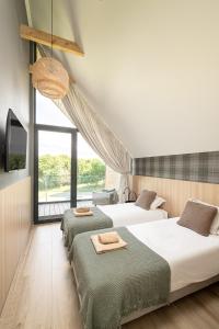 Posteľ alebo postele v izbe v ubytovaní Campo Resort