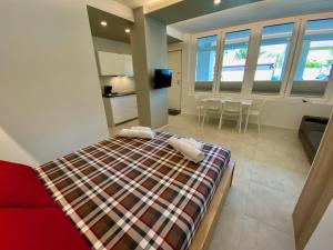 Kuchyň nebo kuchyňský kout v ubytování NEW Residenza le Essenze - i 7 Laghi