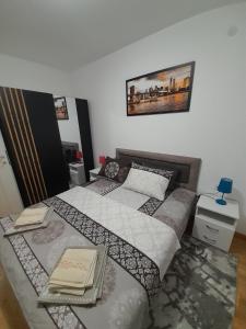 Postel nebo postele na pokoji v ubytování Apartman Luka