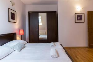 Posteľ alebo postele v izbe v ubytovaní udanypobyt Apartament z Basenem