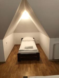 Posteľ alebo postele v izbe v ubytovaní udanypobyt Apartament z Basenem