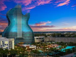 a guitar shaped building with a city in the background at Downtown Hollywood Beach Blvd Studio Getaway in Hollywood