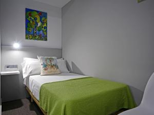 Siaba Pensión Boutique客房内的一张或多张床位