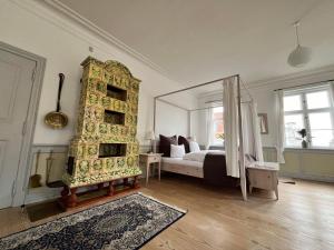 Postel nebo postele na pokoji v ubytování Brødremenighedens Hotel