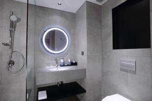 Koupelna v ubytování Grand Aston Puncak Hotel & Resort