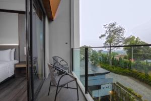 Balkón nebo terasa v ubytování Grand Aston Puncak Hotel & Resort