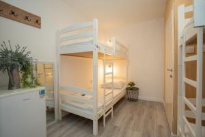 Postel nebo postele na pokoji v ubytování Hostel Novalis
