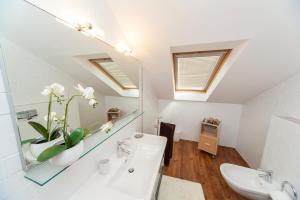 a bathroom with a sink and a mirror at Villa Maslina V,VM in Crikvenica +71 photos