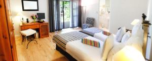 Кровать или кровати в номере Vine Guesthouse