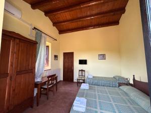 Postel nebo postele na pokoji v ubytování L'Antica Vigna + 37 fotografií