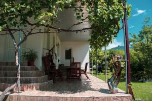 Κήπος έξω από το Guest House Melissa