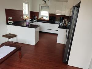 Kuchyň nebo kuchyňský kout v ubytování Ferienhaus SWD
