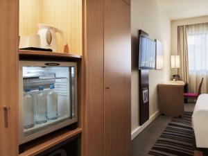 Postel nebo postele na pokoji v ubytování Novotel Athens