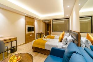 TV a/nebo společenská místnost v ubytování Hotel Palacio Regency
