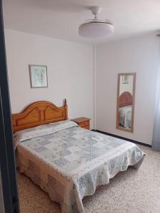 En eller flere senge i et værelse på Apartamento cerca del casco histórico de Tarifa