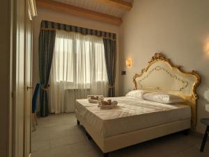 FloVe' Rooms Venice客房内的一张或多张床位